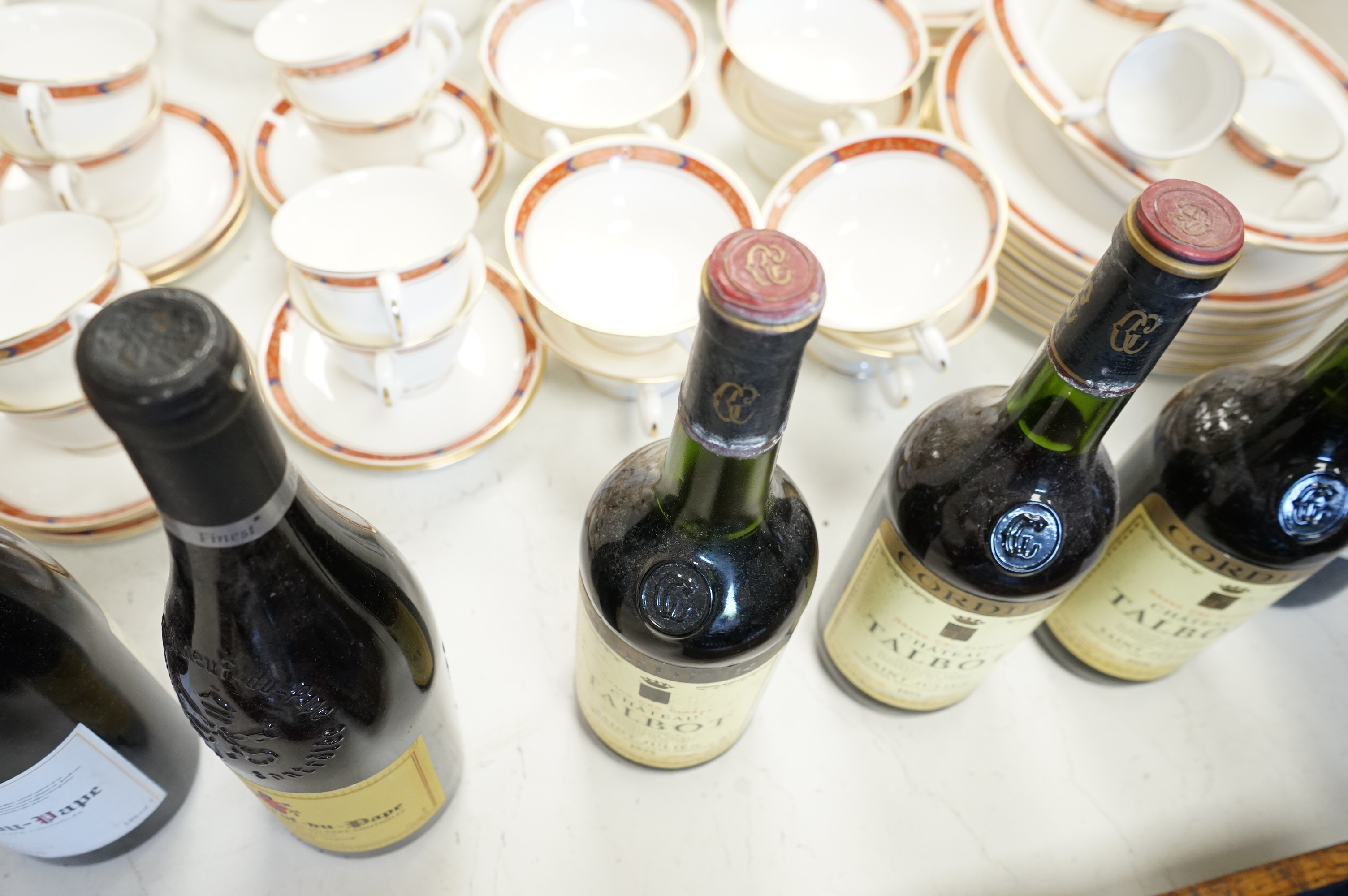 Eight bottles of red wine including three bottles of Chateau Talbot Saint Julien 1975, Chateauneuf du Pape 2008, Chateau Caronne Ste Gemme 1988 etc.